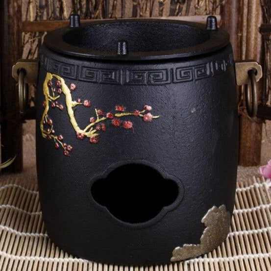 chauffe theiere en fonte 9