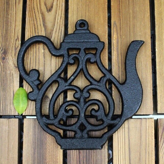 sous theiere en fonte originaux